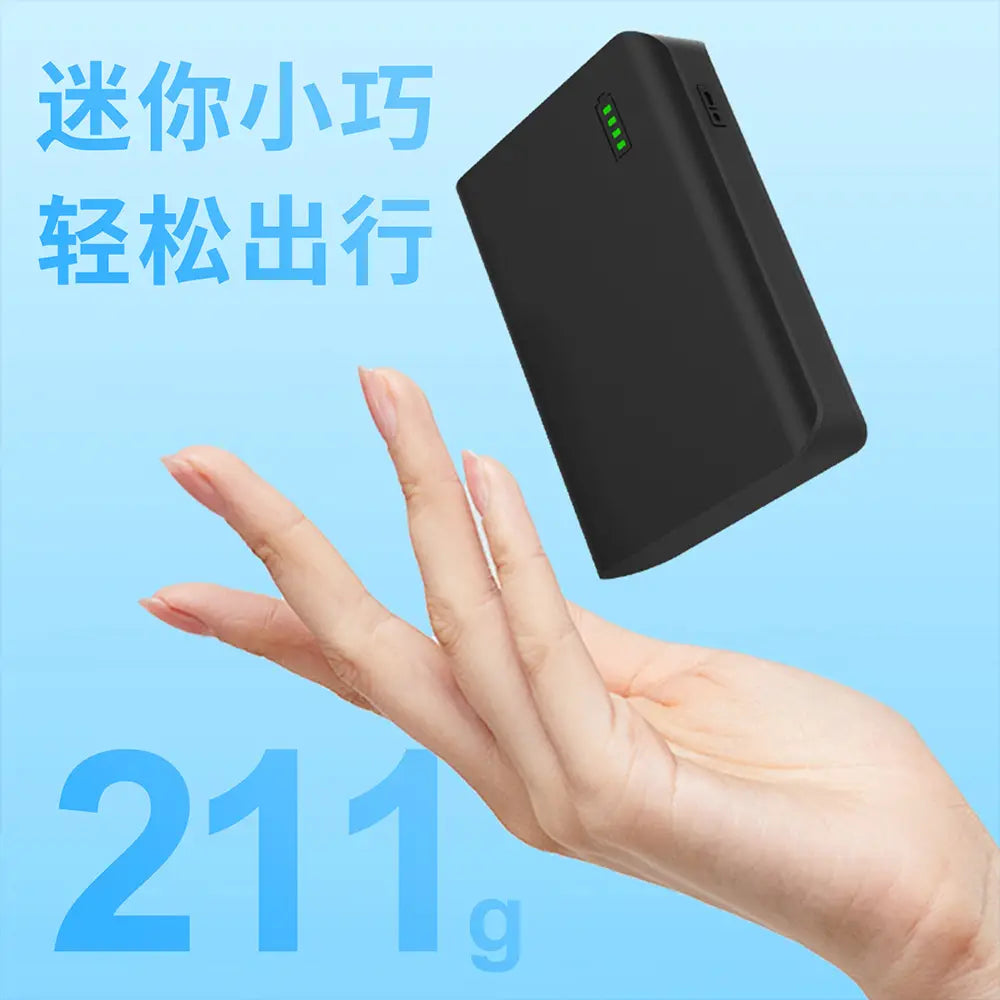 black rectangular portable power bank with green led indicator lights and usb ports designed as a 12v portable power lithium-ion battery pack