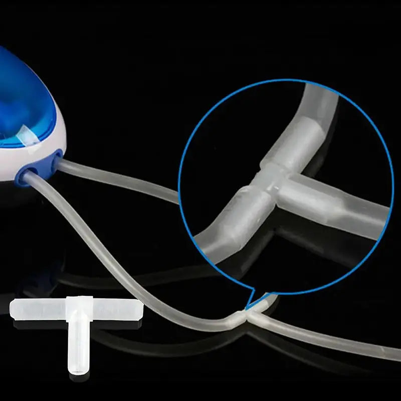 Blue and white aquarium air pump with clear tubing connectors and check valves in an air stone and air tube fish tank accessories kit.