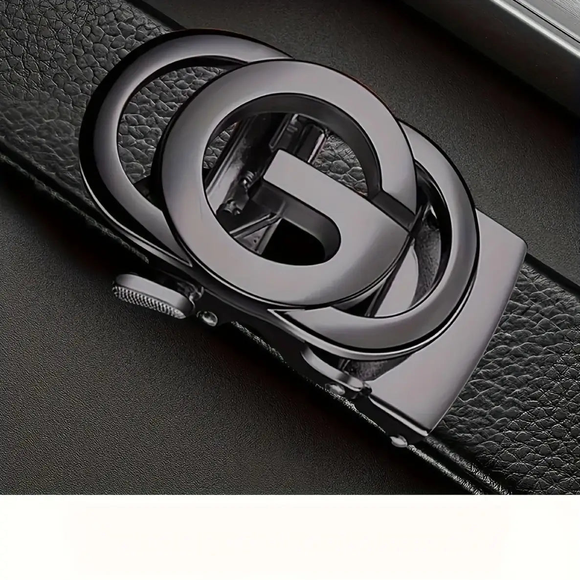 Mens automatic buckle leather belt in black with a sleek matte-finished metal buckle featuring an interlocking double-g design.