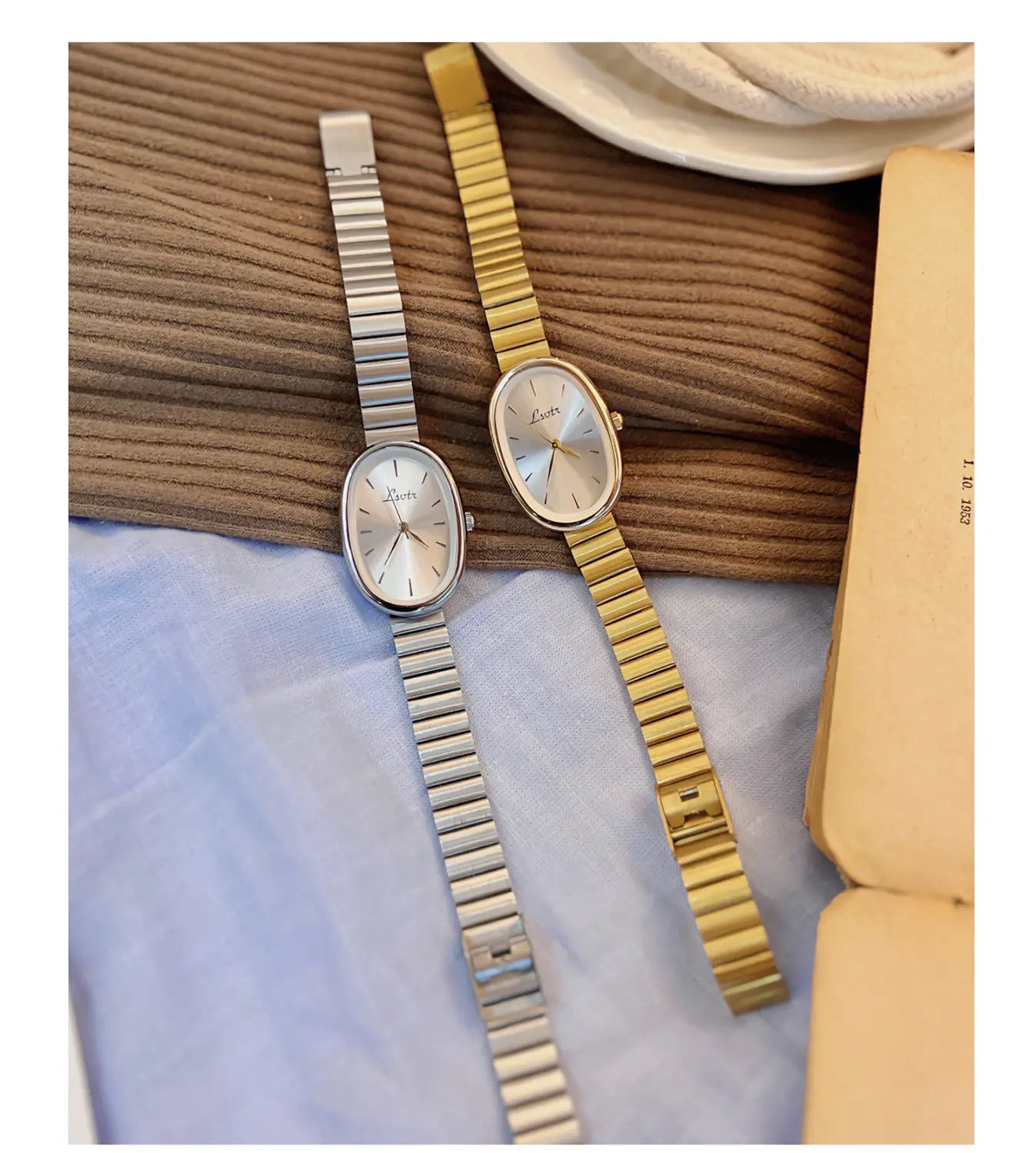 シルバーとゴールドの2色で展開する、女性向けの優雅な楕円形フェイスのミニマリスト腕時計。洗練されたメタルブレスレットとクォーツムーブメントを備えています。