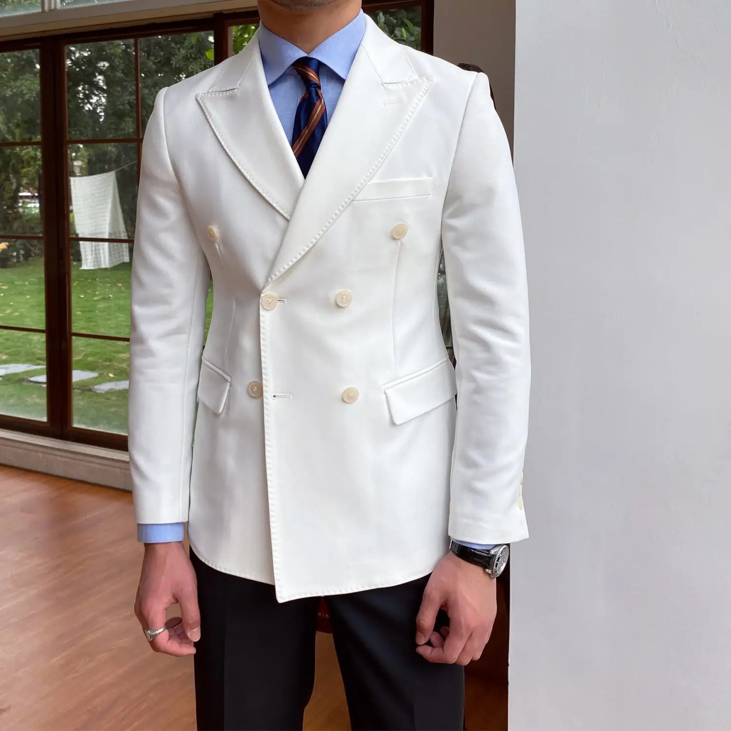 SKU_08_白色 单西装.jpg A crisp white double breasted slim fit blazer jacket with cream-colored buttons and tailored fit for men.