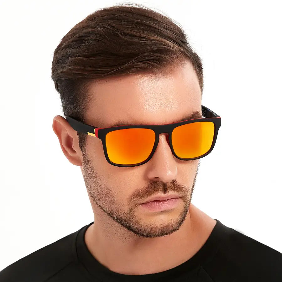 Vintage square luxury brand designer sunglasses featuring black frames with vibrant orange mirrored lenses and a subtle red accent on the temple.