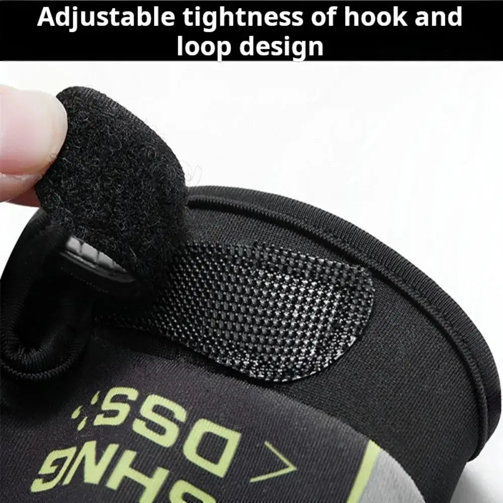 Black adjustable hook and loop strap with a textured grippy surface for secure fastening on ice silk three finger fishing gloves.