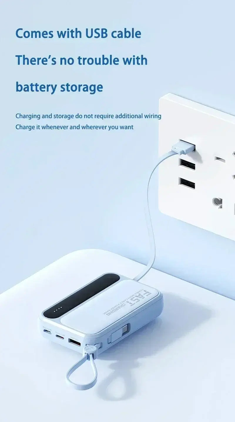 Light blue rectangular power bank with black charging port strip and white usb cable attached designed for fast charging with super fast charging capability.
