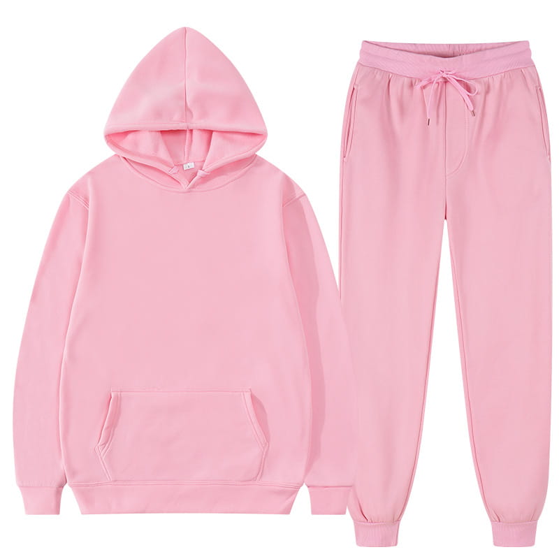 Ensemble décontracté sweat à capuche et jogging en molleton pour homme rose, avec un sweat à capuche et un pantalon de jogging assorti, fabriqués dans un matériau doux en molleton.