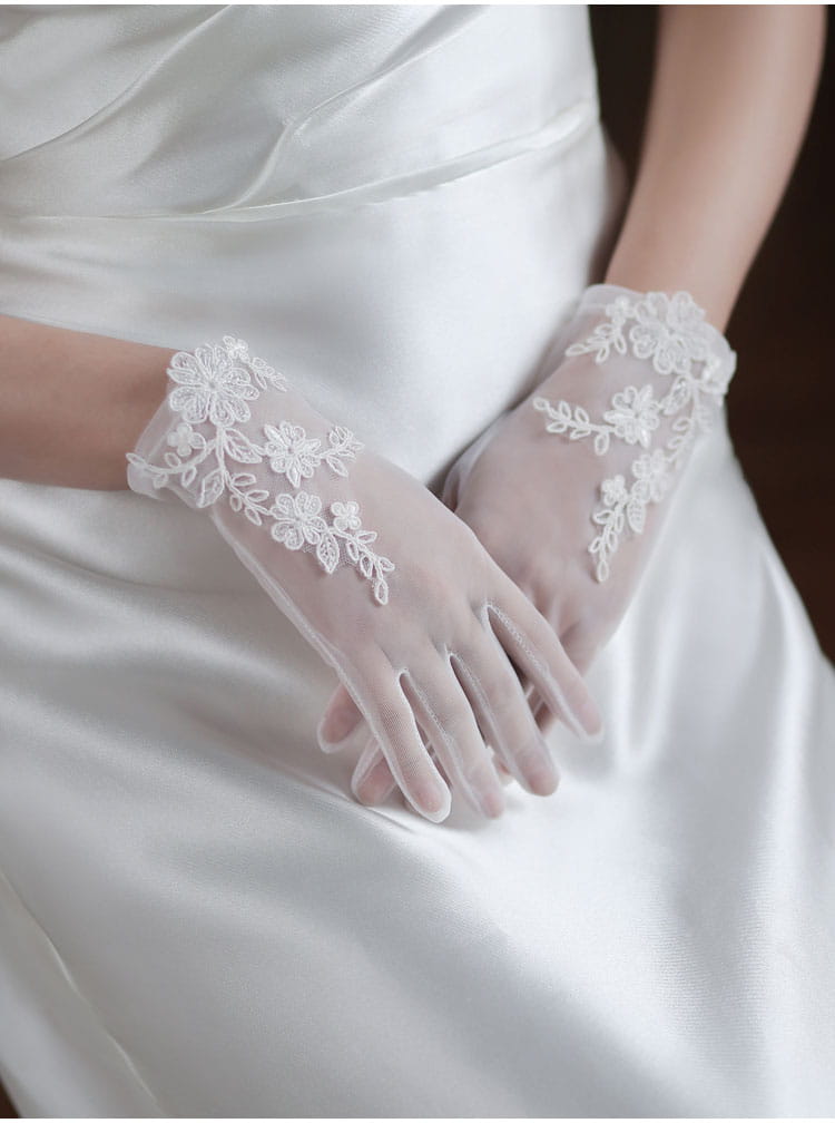 white lace bridal gloves with delicate floral embroidery in short wedding tulle applique design