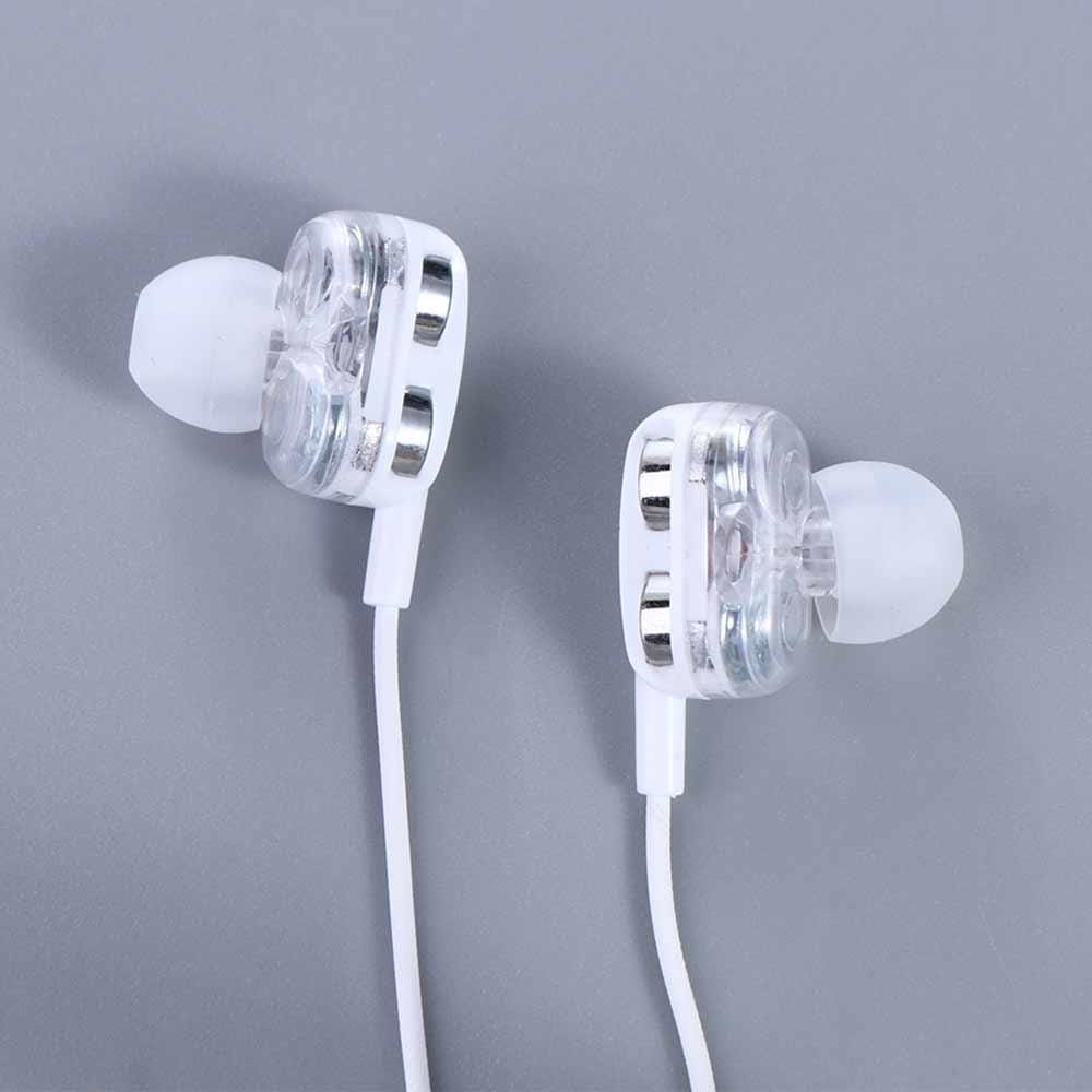 Écouteurs à double dynamique en plastique transparent, avec embouts d’oreille en silicone blanc et accents métalliques argentés, reliés par un fin câble blanc pour une utilisation avec casque stéréo filaire 3,5 mm.