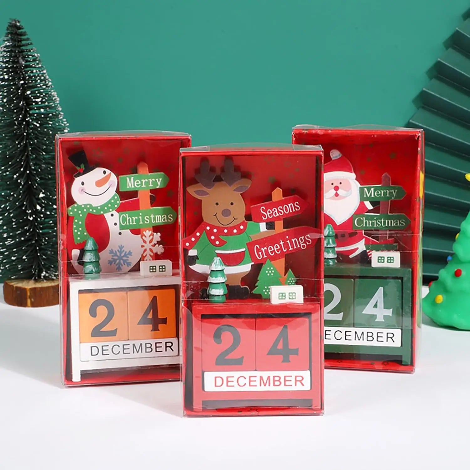 Red wooden Christmas countdown calendar blocks featuring festive character designs and date displays in a plastic material.