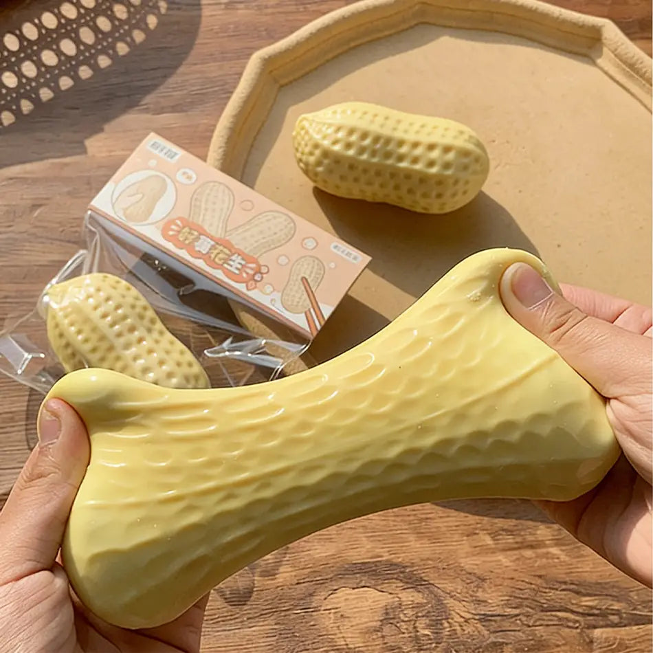 Yellow peanut-shaped soap ball stress relief fidget toy with a textured surface designed for effective stress relief.