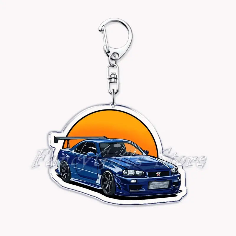 Blue Nissan Skyline r34 gt-r acrylic car keychain with a silver carabiner clip against an orange sunset backdrop.