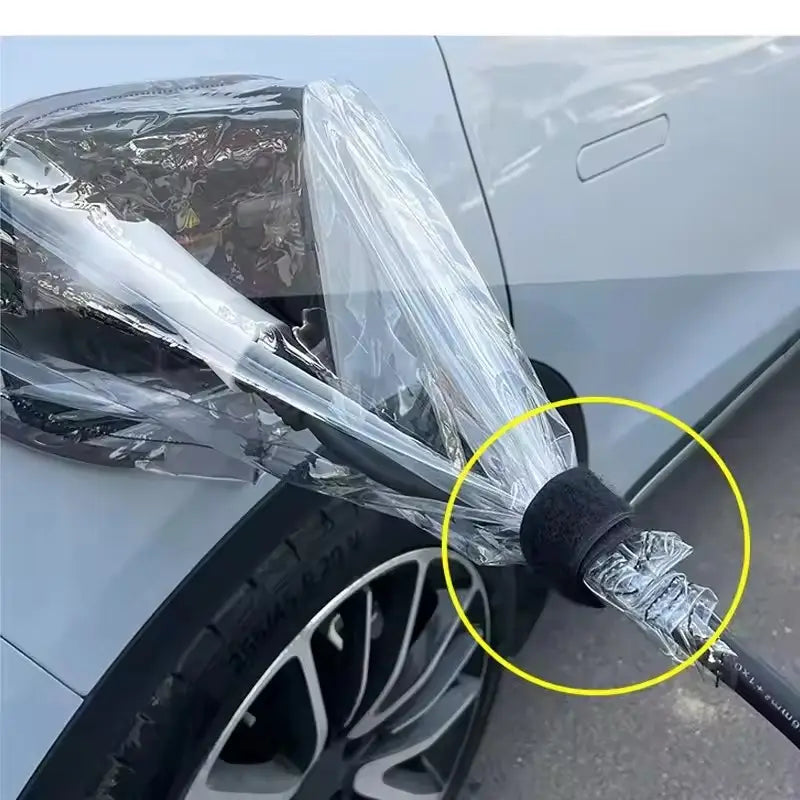 black rubber-covered ev charger rain cover hose wrapped in clear plastic film showing its waterproof magnetic port protector features