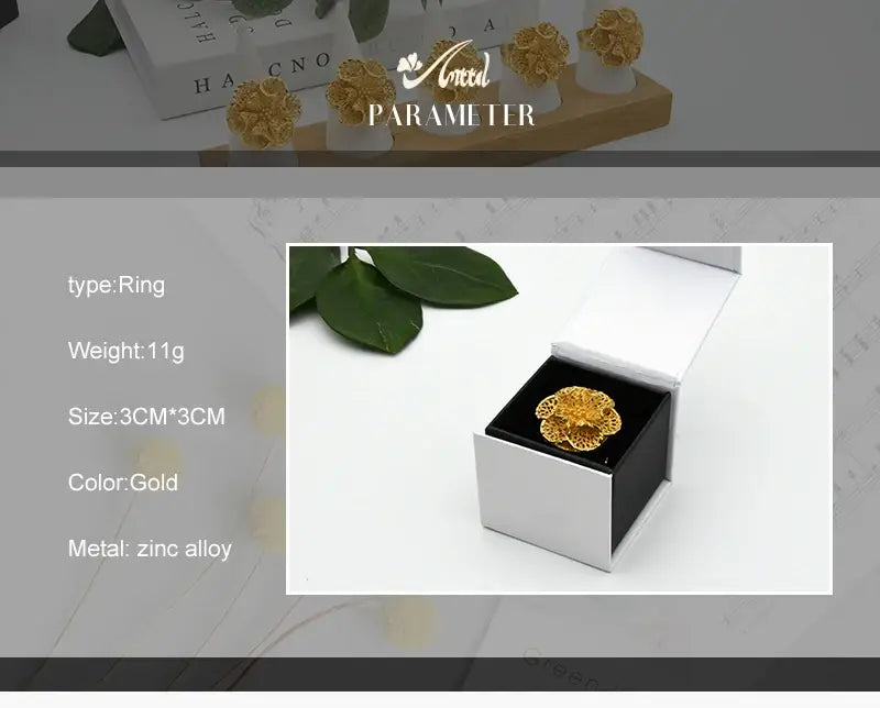 24k gold plated dubai jewelry flower-shaped ring in gold color made of zinc alloy with intricate spiral design for women.