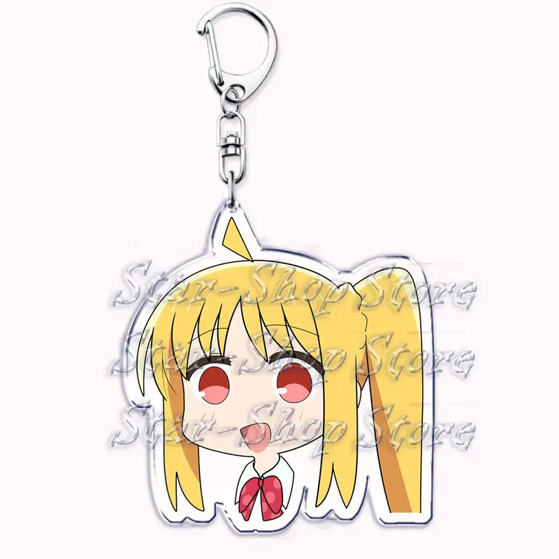 Yellow-haired anime character acrylic keychain with red eyes and a pink bow from Bocchi the Rock made of clear acrylic.
