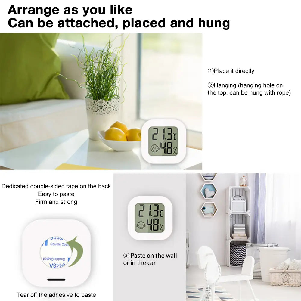 white digital thermometer and hygrometer room sensor with a smiling face display showing an easy-to-read measurement range.