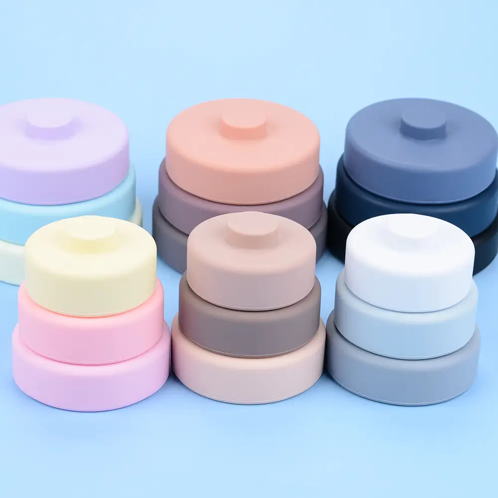 silicone stacking blocks pastel montessori toys featuring pastel-colored silicone stacking rings in soft hues of lavender peach gray and cream