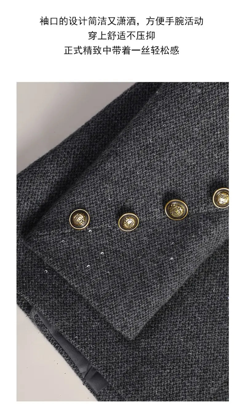Dark gray wool blend double breasted blazer featuring gold toned decorative buttons.