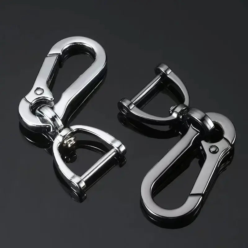 Stainless steel carabiner car keychain in shiny silver metal with a sleek polished finish and sturdy construction.