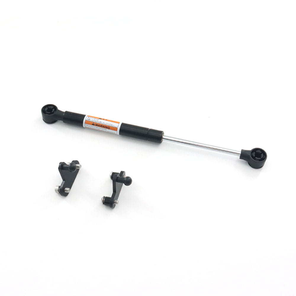 Black gas spring with metallic rod and two black mounting brackets for Harley Touring trunk support rod 2014-2023.