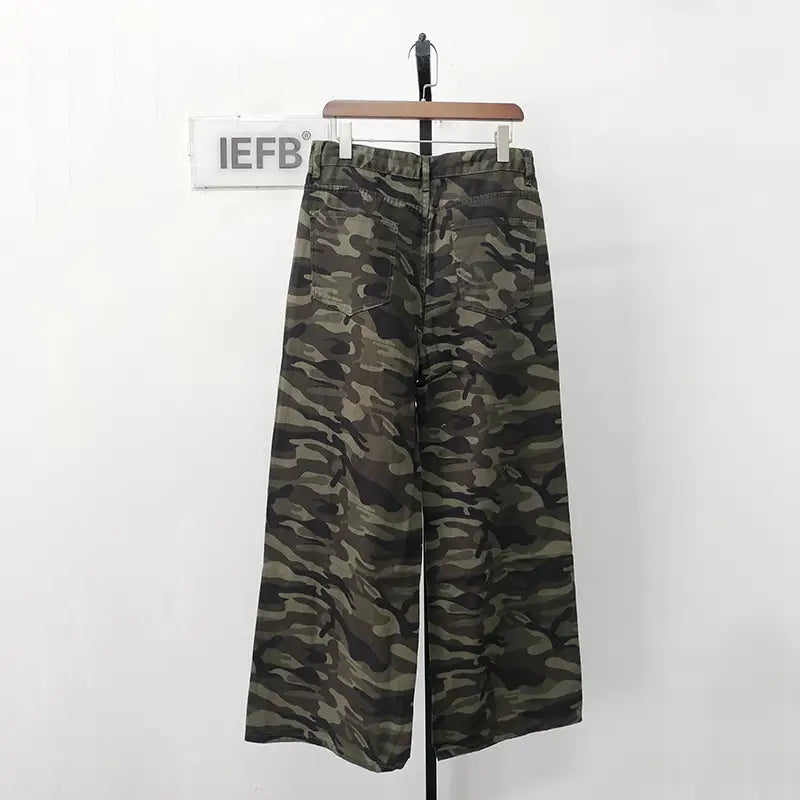 Iefb camouflage wide leg denim jeans featuring a blend of olive dark green and brown tones in a camouflage pattern.