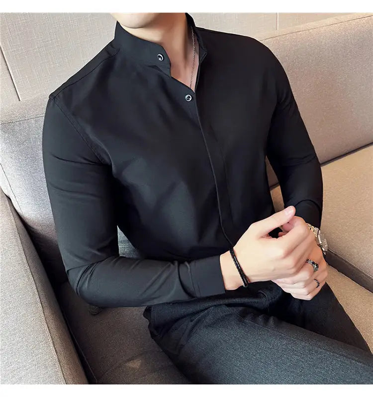 black long-sleeved slim fit dress shirt with stand collar and subtle button details designed for a formal look and correct size fit