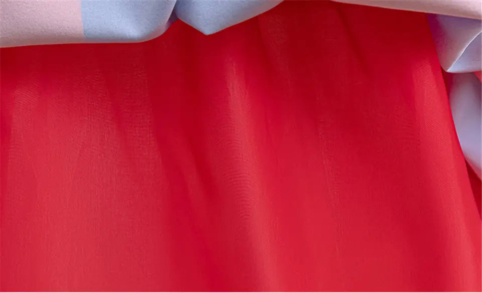 pomni clown costume dress in bright red satin fabric with a smooth glossy finish alongside the size chart