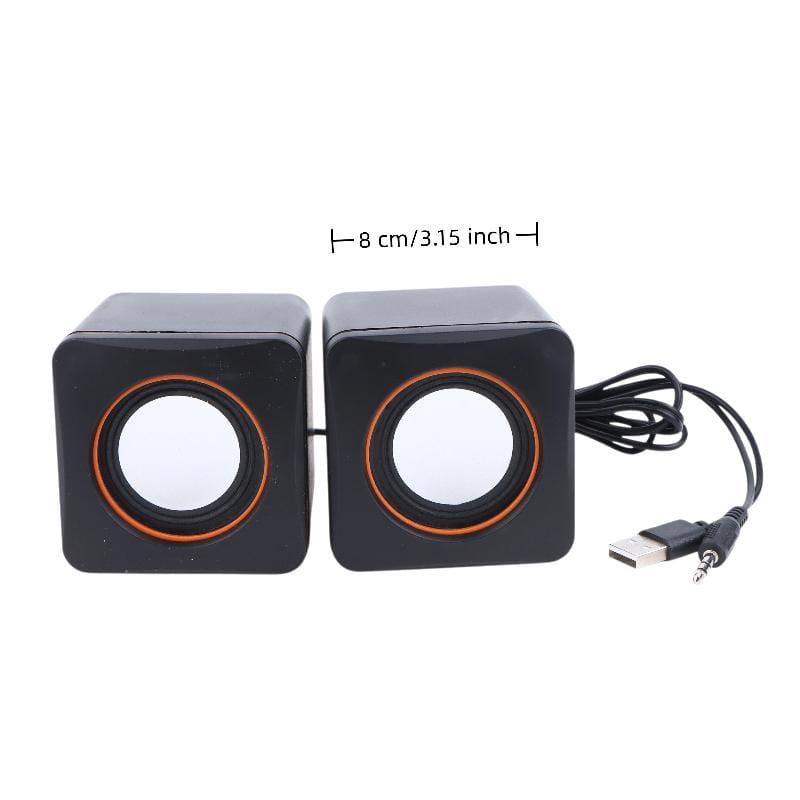 black and orange cube-shaped usb computer speakers led stereo desktop pc audio with 3.15-inch white circular drivers and black cable connecting usb-a to 3.5mm jack adapter