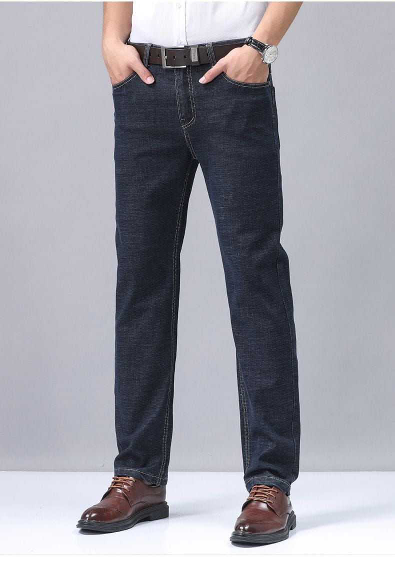 Men’s stretch cotton straight indigo denim jeans with classic stitching for casual trousers.