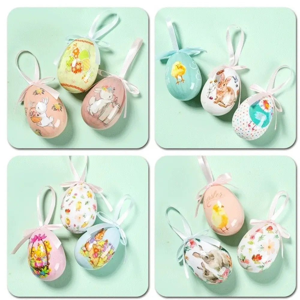 Pastellfarbene, bemalte Formschaum-Ostereier-Anhänger mit bedruckten Hasen- und Kükenmotiven, jedes mit einer zarten Schleife aus Band gebunden