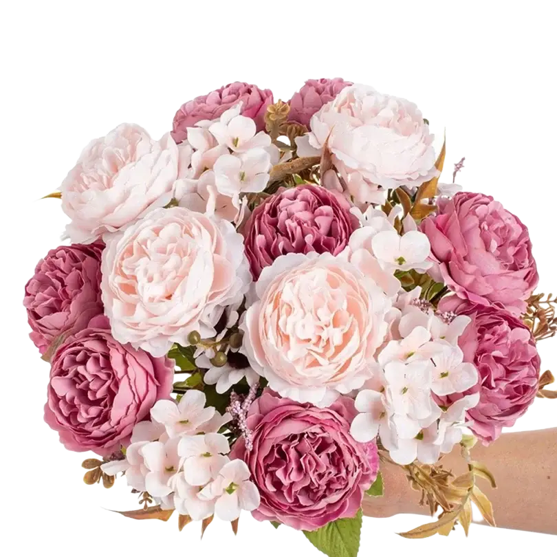 A lush bouquet of artificial silk Persian peonies in pink with white fillers and gold foliage for home decoration and gifting