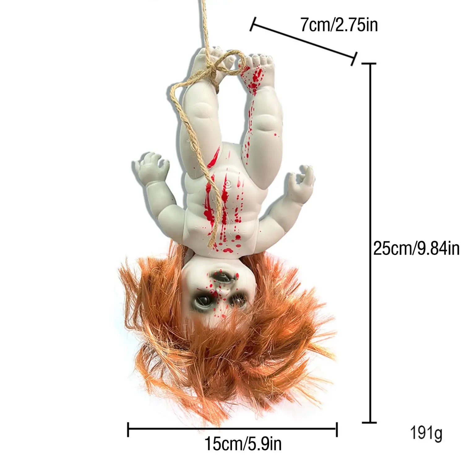 A white plastic Halloween hanging ghost doll with orange hair and red splatter details hanging upside down by a rope as a spooky prop.