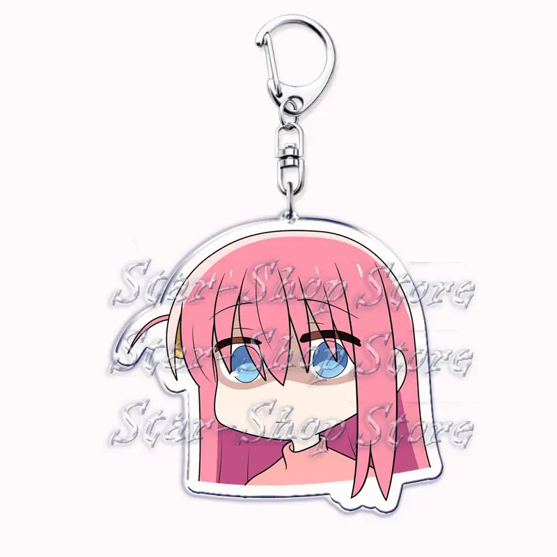 Pink-haired anime character acrylic keychain from Bocchi the Rock with blue eyes and a silver metal clasp.