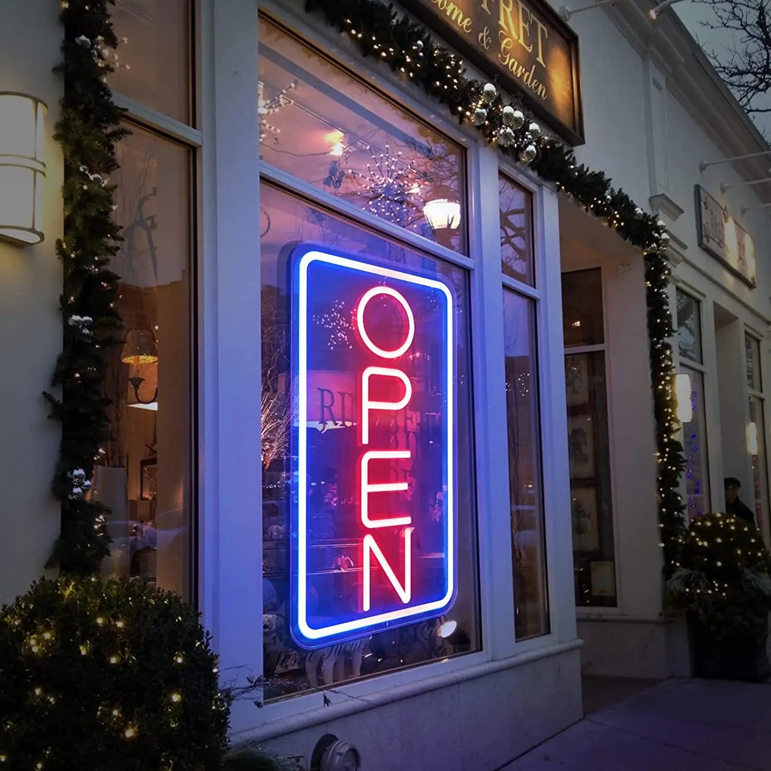 a led open neon sign with adjustable brightness featuring red lettering and a blue border glowing as a vibrant light source and neon sign for window display use.