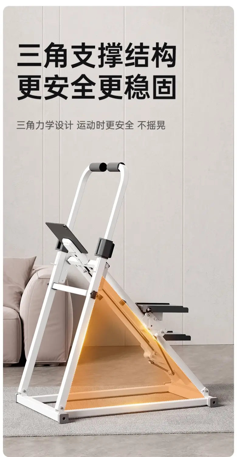 Équipement de machine d’escalier en blanc et orange pour le fitness à domicile, avec un design de châssis triangulaire robuste pour des exercices en intérieur efficaces.
