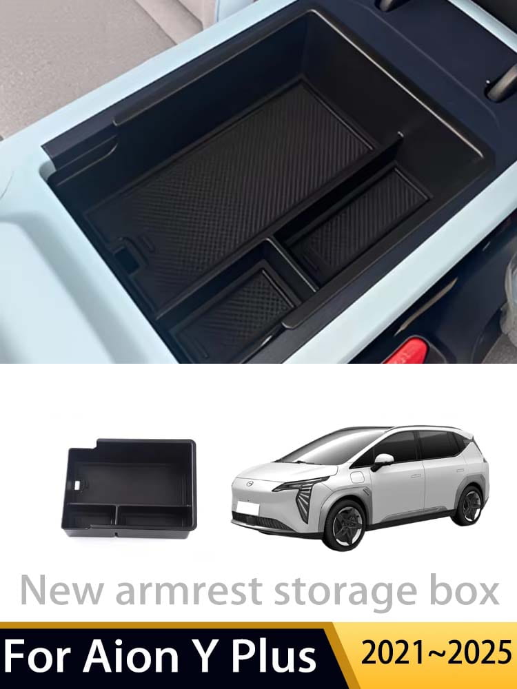 Organizador para consola central Aion Y Plus de plástico negro, con compartimentos interiores con textura para el almacenamiento del reposabrazos.