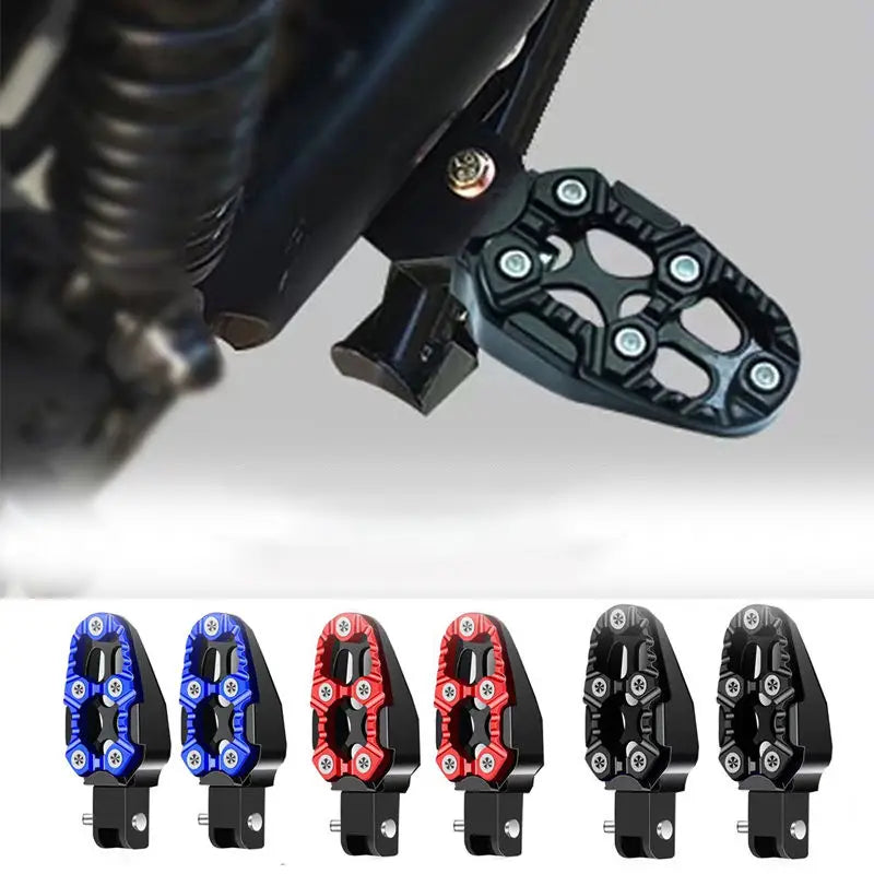 Black textured cnc aluminum motorcycle foot peg with a rugged multi-angled design and silver bolts for rear anti slip pedals shown from the back side