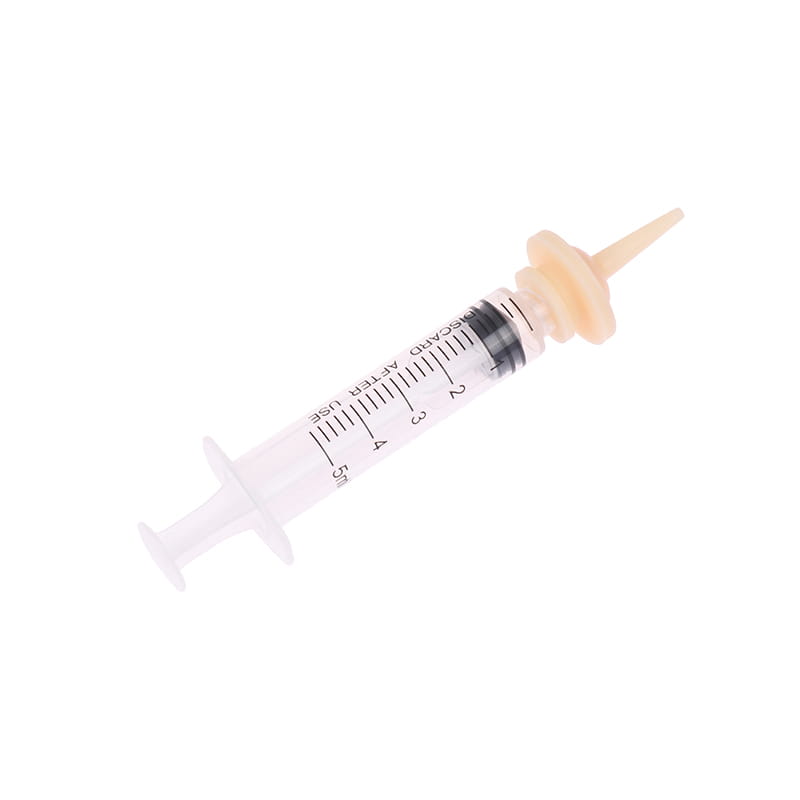 clear plastic pet oral syringe feeding set with silicone beige nipple attachment and black measurement markings