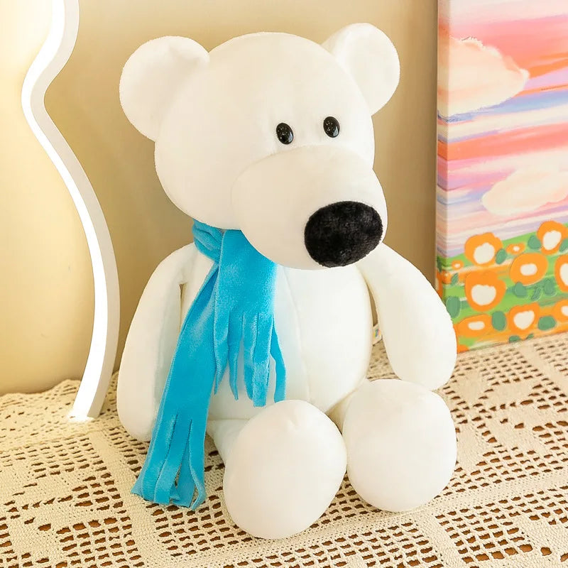 Oso polar blanco de peluche con ojos y nariz negros tipo botón, que lleva una bufanda de terciopelo azul brillante, de la colección de muñecos blandos de animales de la jungla.