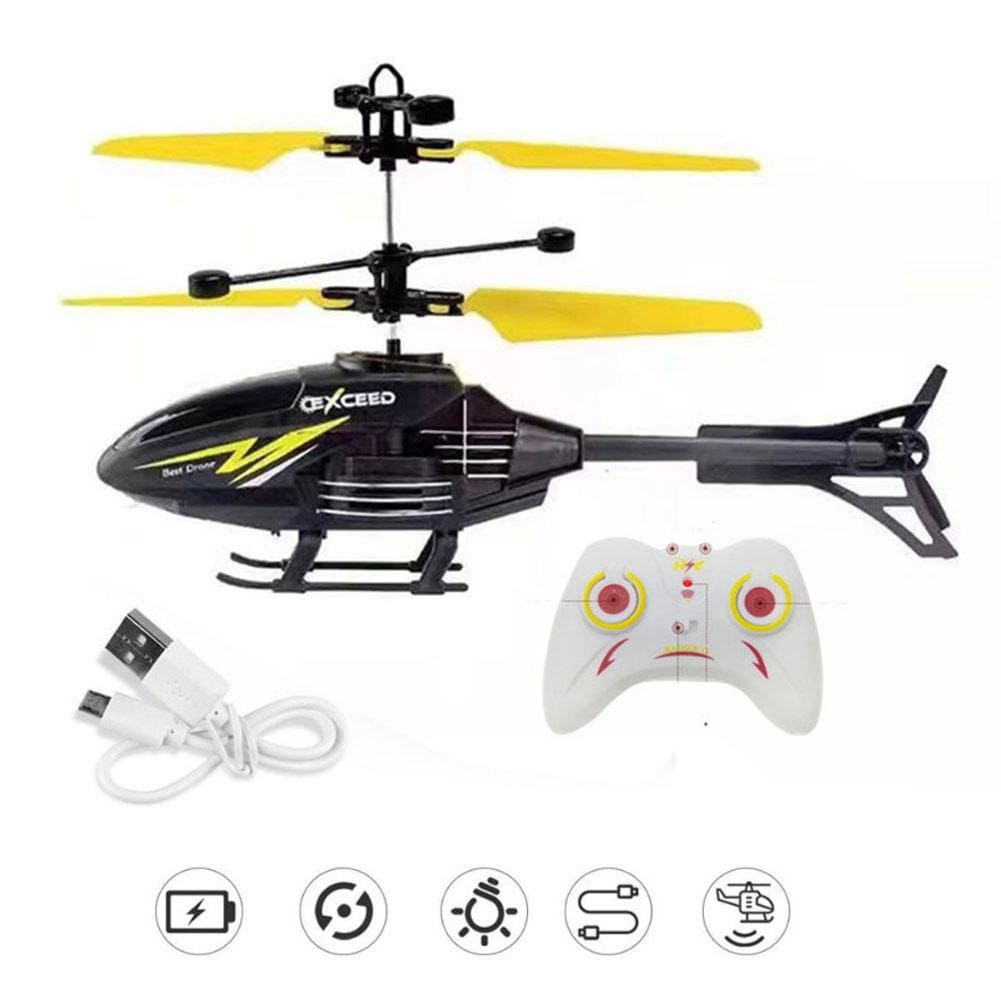 Black and yellow exceed brand remote control induction suspension helicopter toy with a white controller and usb charging cable.