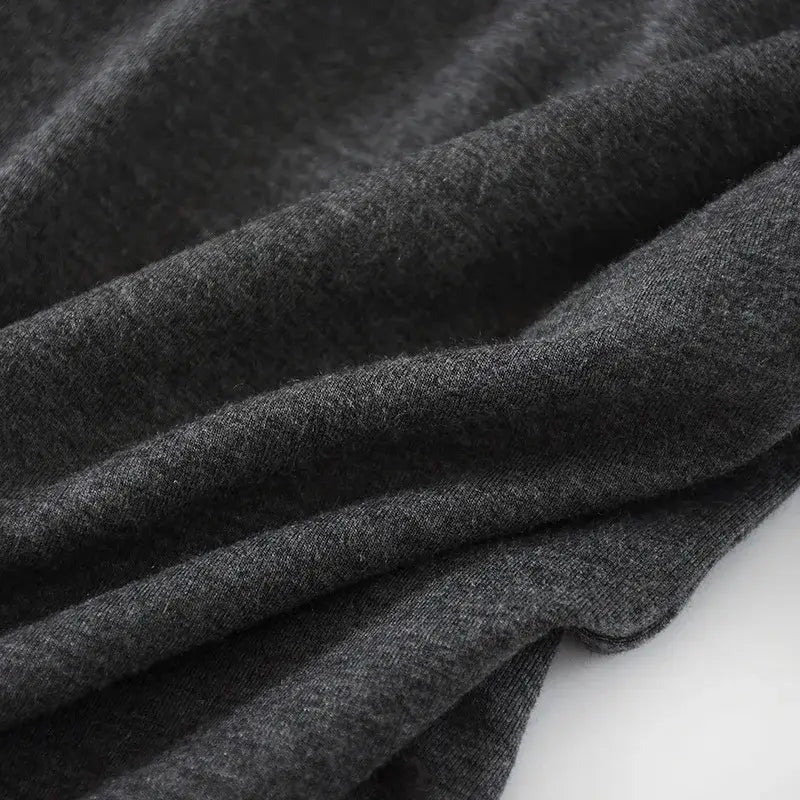 Herren-Modal-Cotton-Loungewear-Shorts in dunkelgrauem, weich strukturiertem Strickstoff mit dezent meliertem Erscheinungsbild.