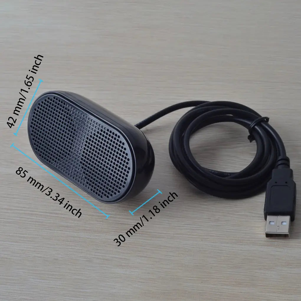 Schwarzer, per USB betriebener Desktop-Lautsprecher mit perforiertem Gitter und rundem, oval geformtem Gehäuse für die Nutzung als tragbare Computer-Soundbar