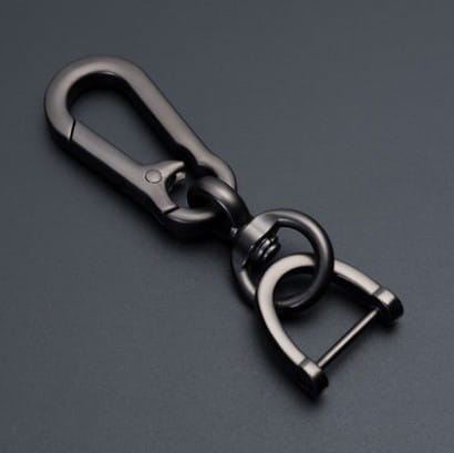 Black metal anti-lost stainless steel car key ring pendant with a sturdy sleek design and secure locking mechanism.