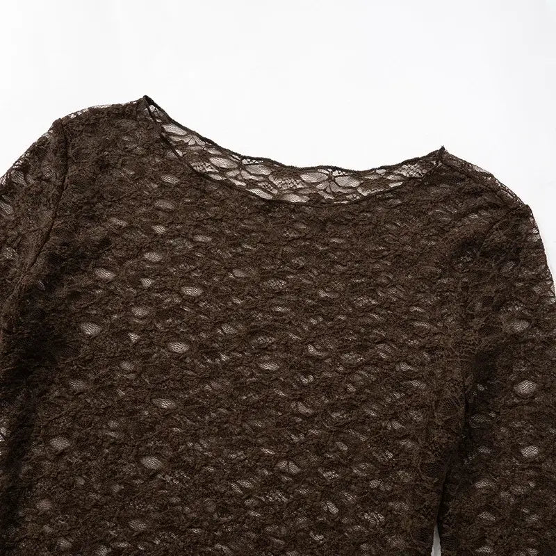 A dark brown long sleeve crop top for women aesthetic clothes featuring intricate lace patterns with soft flowing texture and delicate eyelet-style detailing.