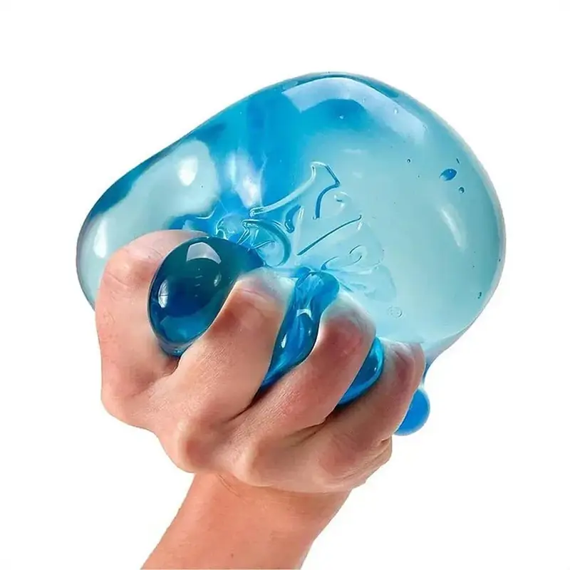 a translucent blue gel-like stress ball with a glossy finish and embossed floral design shown from the front as part of the needoh nice cube fidget toy collection