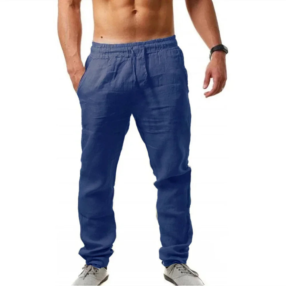 Pantalones de chándal ligeros de lino azules para hombre con cintura elástica y cordón para comodidad y estilo.
