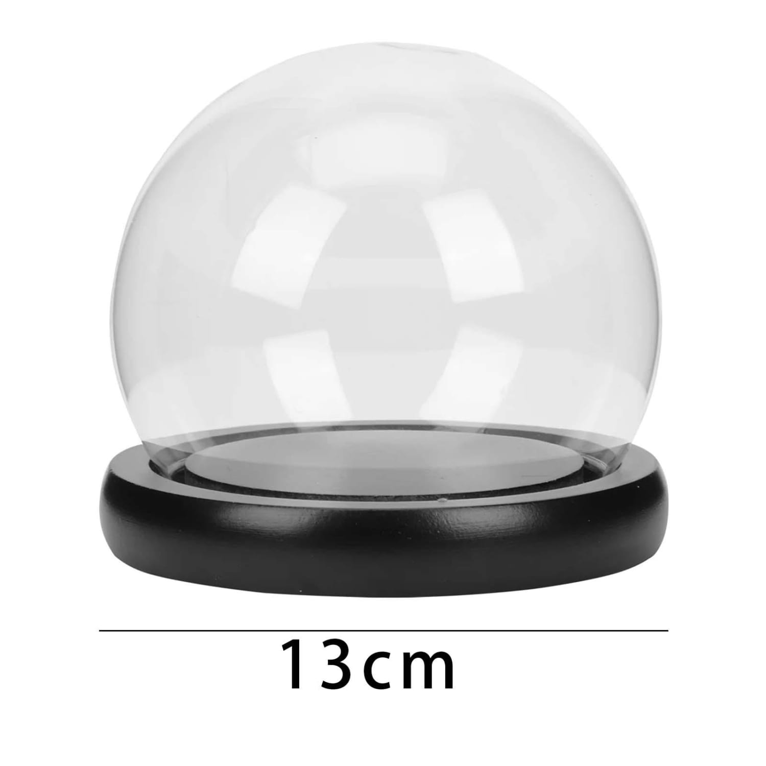 Glass display dome with dried floral arrangement featuring a clear glass dome and black wooden base measuring 13 cm in diameter.