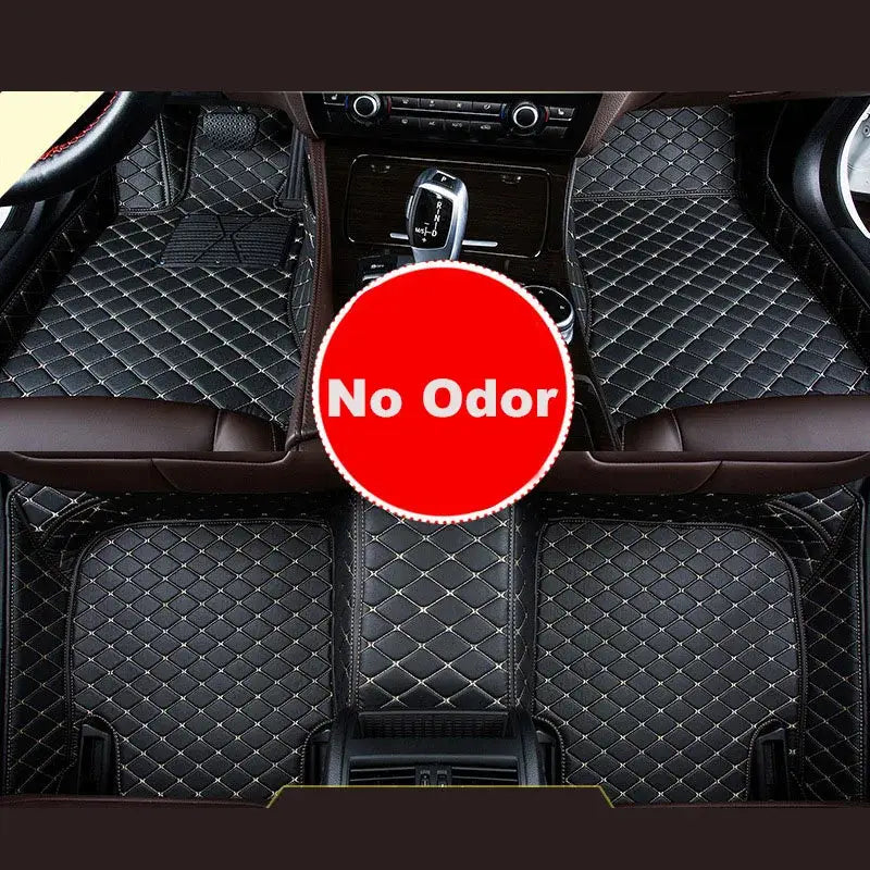 Black diamond-quilted leather car floor mats for Ssangyong Tivoli with white stitching.
