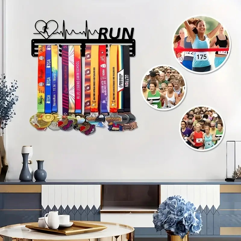 black metal running medal display rack with a wall-mounted heartline design and the word run above colorful race ribbons and medals