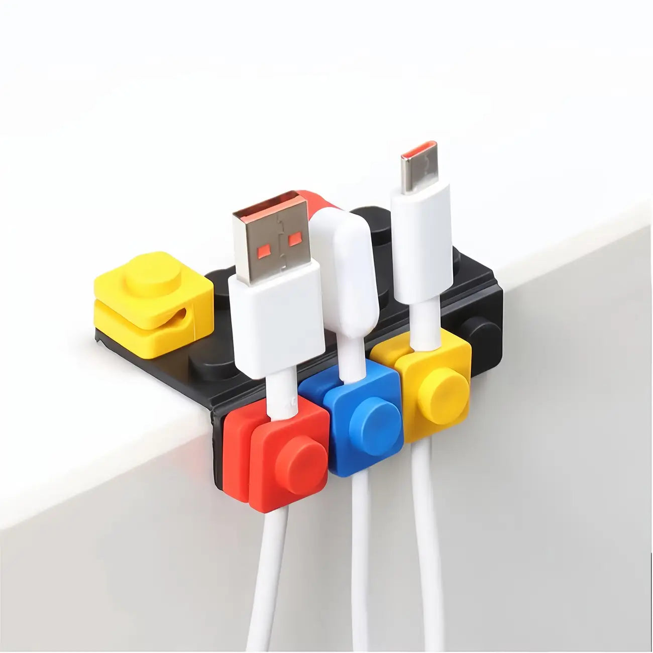 Modular brick cable organizer 2 sets featuring colorful plastic holders with usb and lightning connectors for efficient cable management.