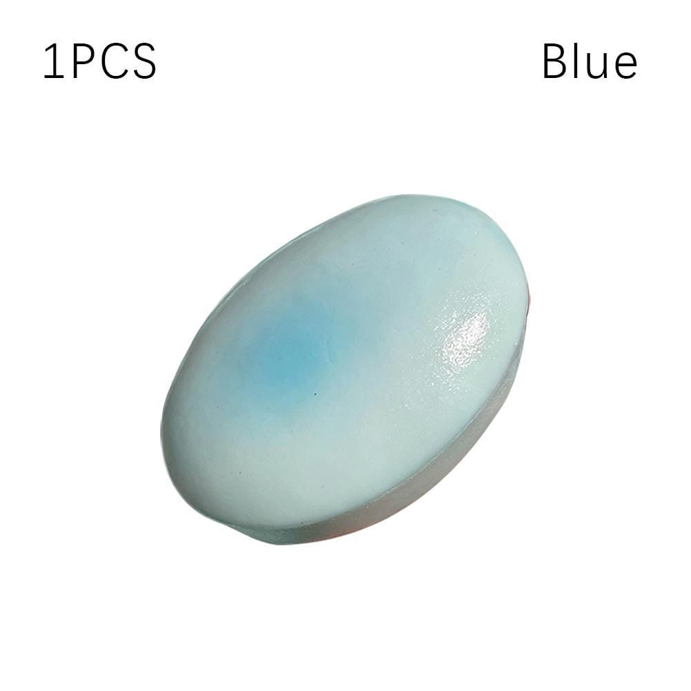 Juguete esponjoso para aliviar el estrés en forma de óvalo de color azul, lento en elevarse, con una superficie lisa y brillante y un gradiente sutil desde azul claro hasta azul más oscuro.