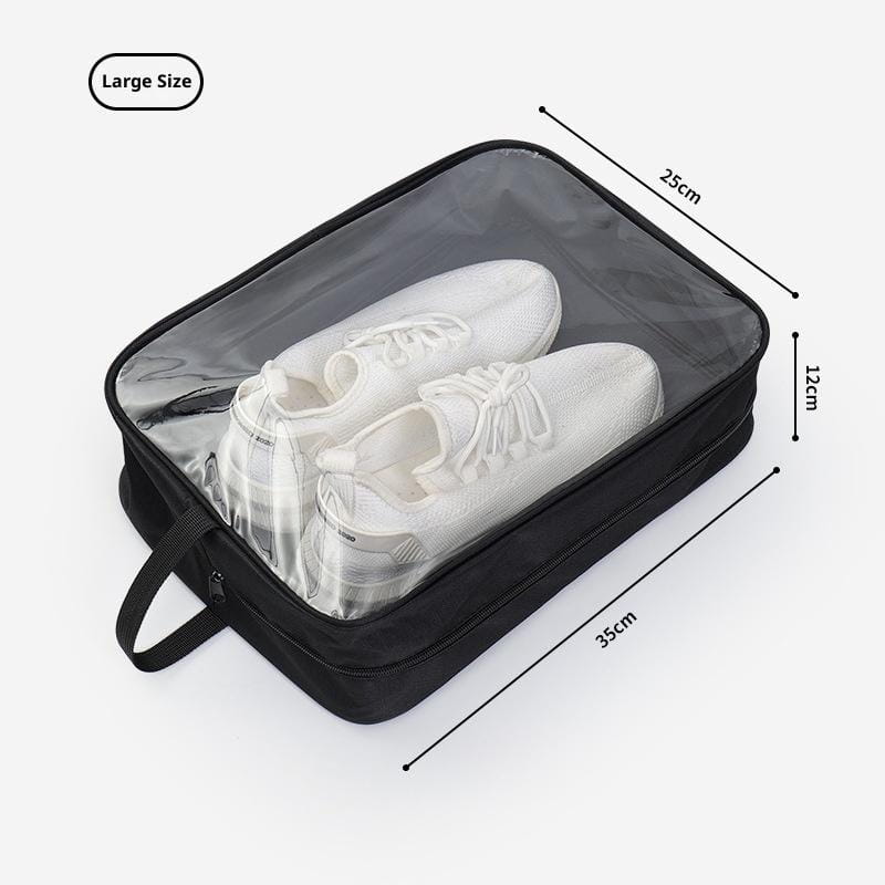 Sac de voyage imperméable rectangulaire noir pour chaussures, avec panneau supérieur transparent et fermeture à glissière pour un rangement sécurisé.